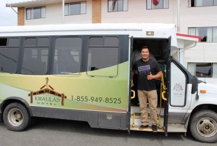 Eddie Walkus takes guests to their tours on the k’awat’si Tours mini coach.
