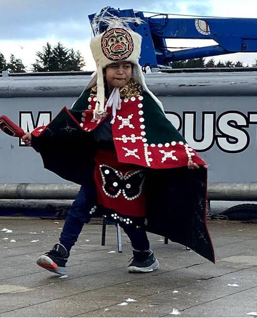 Takoda George dancing at the Mars Rustler boat blessing